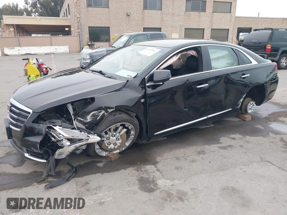 2018 Cadillac XTS Luxury with VIN 2G61M5S33J9119684, listed as a IAAI auction lot 41659807 with 107,156 mi miles and . Bid and sale history available at DreamBid. Image 18.