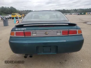 1998 Nissan 240SX z VIN JN1AS44D9WW105258, wystawiony jako Copart lot #71475754 z przebiegiem 363 254 mil mil oraz Szkody całkowita. Historia ofert i sprzedaży dostępna na DreamBid. Obrazek 6.