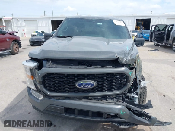2021 Ford F-150 XL with VIN 1FTEW1CP3MFA80786, listed as a IAAI auction lot 42061952 with 32,071 mi miles. Bid and sale history available at carsss.com. Image 12.