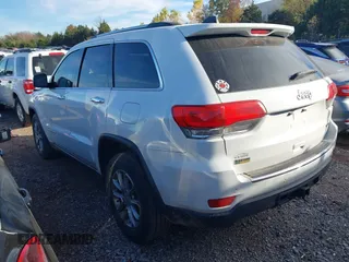 2015 Jeep Grand Cherokee Limited with VIN 1C4RJEBG8FC822774, listed as a IAAI auction lot 40939140 with 146,609 mi miles. Bid and sale history available at carsss.com. Image 3.