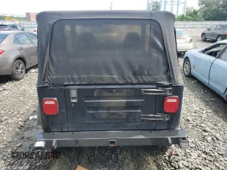 1999 Jeep Wrangler SE z VIN 1J4FY29P0XP479580, wystawiony jako Copart lot #63075455 z przebiegiem 160 986 mil mil oraz Szkoda całkowita • Salvage title. Historia ofert i sprzedaży dostępna na DreamBid. Obrazek 6.