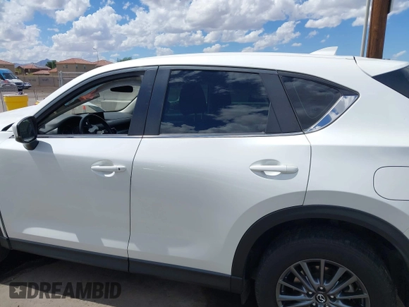 2020 Mazda CX-5 Sport with VIN JM3KFABM1L1752583, listed as a IAAI auction lot 40349125 with 50,134 mi miles. Bid and sale history available at carsss.com. Image 14.