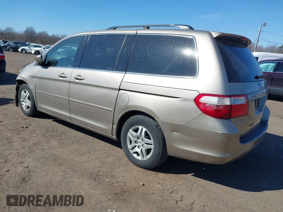 2006 Honda Odyssey EX-L z VIN 5FNRL38736B069969, wystawiony jako IAAI lot #41695311 z przebiegiem 196 218 mil mil oraz . Historia ofert i sprzedaży dostępna na DreamBid. Obrazek 3.
