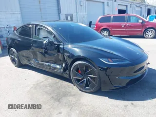 2025 Tesla Model 3 Performance with VIN 5YJ3E1ET0SF933067, listed as a IAAI auction lot 42002688 with 4,386 mi miles and . Bid and sale history available at DreamBid. Image 1.
