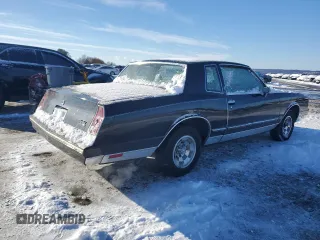 1984 Chevrolet Monte Carlo z VIN 1G1AZ37H3EB102999, wystawiony jako Copart lot #87061824 z przebiegiem 271 202 mil mil oraz Szkody całkowita. Historia ofert i sprzedaży dostępna na DreamBid. Obrazek 3.