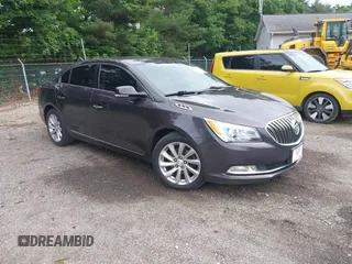 2014 Buick LaCrosse Leather z VIN 1G4GB5G33EF249494, wystawiony jako IAAI lot #42538524 z przebiegiem 209 091 mil mil oraz . Historia ofert i sprzedaży dostępna na DreamBid. Obrazek 1.