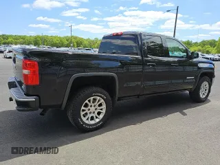 2014 GMC Sierra 1500 SLE z VIN 1GTV2UEH9EZ314965, wystawiony jako Copart lot #57174485 z przebiegiem 100 292 mil mil oraz Czysty tytuł • Clean title. Historia ofert i sprzedaży dostępna na DreamBid. Obrazek 3.