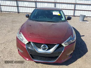 2016 Nissan Maxima Platinum z VIN 1N4AA6AP1GC416590, wystawiony jako IAAI lot #41817288 z przebiegiem 248 514 mil mil oraz . Historia ofert i sprzedaży dostępna na DreamBid. Obrazek 13.