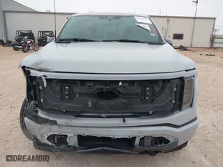2023 Ford F-150 Lightning Pro with VIN 1FTVW1EL7PWG19070, listed as a IAAI auction lot 41536193 with 22,654 mi miles. Bid and sale history available at carsss.com. Image 13.