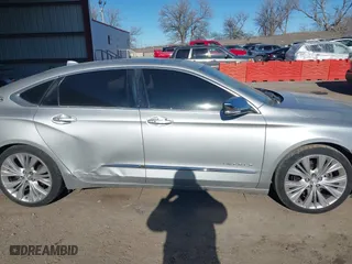 2014 Chevrolet Impala LTZ with VIN 2G1155S32E9282710, listed as a IAAI auction lot 41250424 with 154,486 mi miles. Bid and sale history available at carsss.com. Image 13.