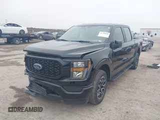 2023 Ford F-150 XL with VIN 1FTEW1C55PKD01184, listed as a IAAI auction lot 41700658 with 18,804 mi miles. Bid and sale history available at carsss.com. Image 2.