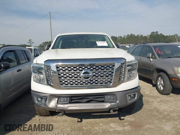 2016 Nissan Titan Platinum Reserve z VIN 1N6BA1F22GN509568, wystawiony jako IAAI lot #41766629 z przebiegiem 94 991 mil mil oraz . Historia ofert i sprzedaży dostępna na DreamBid. Obrazek 12.