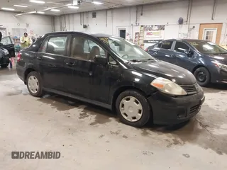 2007 Nissan Versa 1.8 SL with VIN 3N1BC11E47L411983, listed as a IAAI auction lot 41391334 with 201,830 mi miles. Bid and sale history available at carsss.com. Image 1.