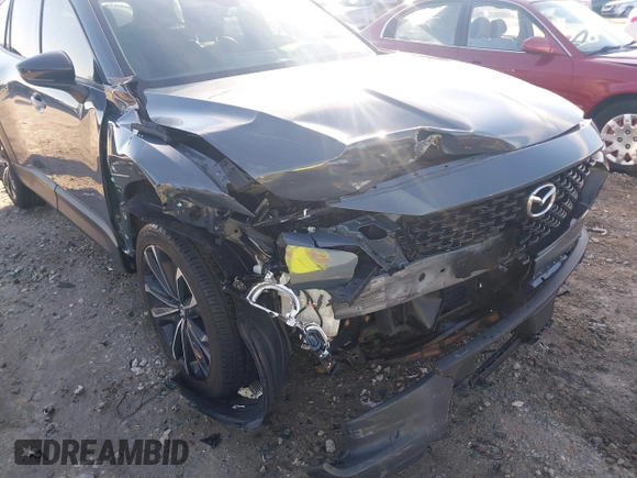 2023 Mazda CX-50 S Premium Plus with VIN 7MMVABEM2PN102083, listed as a IAAI auction lot 41589242 with 75,373 mi miles and . Bid and sale history available at DreamBid. Image 6.