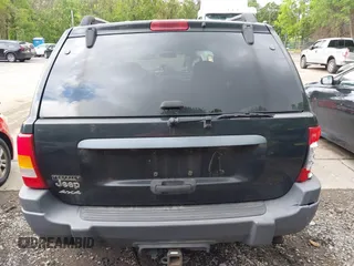 2004 Jeep Grand Cherokee Laredo with VIN 1J8GW48S94C357443, listed as a IAAI auction lot 42309958 with 176,738 mi miles and . Bid and sale history available at DreamBid. Image 16.