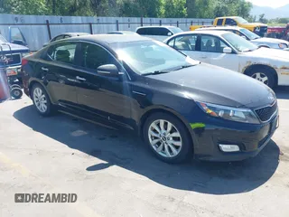 2015 Kia Optima LX z VIN KNAGM4A7XF5619641, wystawiony jako IAAI lot #42502989 z przebiegiem 172 492 mil mil oraz . Historia ofert i sprzedaży dostępna na DreamBid. Obrazek 1.