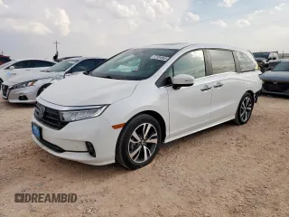 2024 Honda Odyssey Touring with VIN 5FNRL6H82RB075678, listed as a Copart auction lot 57594955 with 11,701 mi miles and Salvage title. Bid and sale history available at DreamBid. Image 1.
