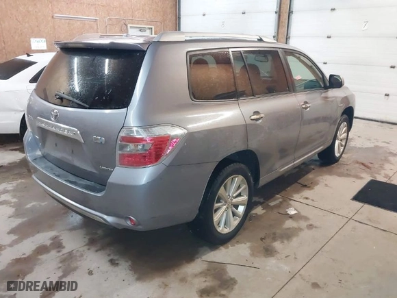 2009 Toyota Highlander Hybrid Limited with VIN JTEEW44A292032380, listed as a IAAI auction lot 41548361 with 253,079 mi miles. Bid and sale history available at carsss.com. Image 4.