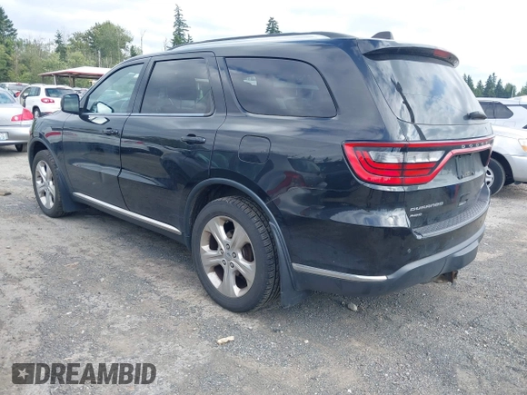 2014 Dodge Durango Limited with VIN 1C4RDJDG0EC310406, listed as a IAAI auction lot 42603939 with 165,439 mi miles and . Bid and sale history available at DreamBid. Image 3.