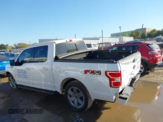 2018 Ford F-150 XL with VIN 1FTEW1EG1JKE29623, listed as a IAAI auction lot 40615703 with 122,846 mi miles and . Bid and sale history available at DreamBid. Image 14.