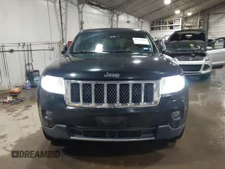 2013 Jeep Grand Cherokee Overland with VIN 1C4RJECT4DC526465, listed as a IAAI auction lot 41570663 with 116,948 mi miles. Bid and sale history available at carsss.com. Image 12.