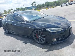 2017 Tesla Model S 100D with VIN 5YJSA1E47HF185734, listed as a IAAI auction lot 42076544 with 56,682 mi miles. Bid and sale history available at carsss.com. Image 1.