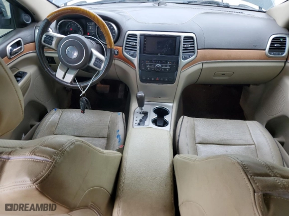2011 Jeep Grand Cherokee Overland with VIN 1J4RR6GT4BC713527, listed as a Copart auction lot 49399445 with 145,242 mi miles and Salvage Title. Bid and sale history available at carsss.com. Image 8.