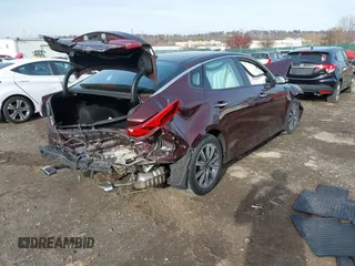 2019 Kia Optima EX with VIN 5XXGU4L11KG313557, listed as a IAAI auction lot 40973008 with 66,269 mi miles. Bid and sale history available at carsss.com. Image 4.