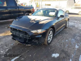2019 Ford Mustang EcoBoost z VIN 1FA6P8TH7K5133596, wystawiony jako IAAI lot #41423178 z przebiegiem 123 372 mil mil oraz . Historia ofert i sprzedaży dostępna na DreamBid. Obrazek 17.