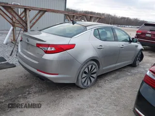 2012 Kia Optima SX with VIN 5XXGR4A62CG027184, listed as a IAAI auction lot 41236626 with 121,686 mi miles and . Bid and sale history available at carsss.com. Image 4.