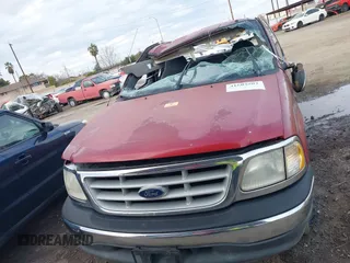 1999 Ford F-150 XL with VIN 1FTRX17L0XKA67494, listed as a IAAI auction lot 41603503 with Not Provided miles. Bid and sale history available at carsss.com. Image 12.