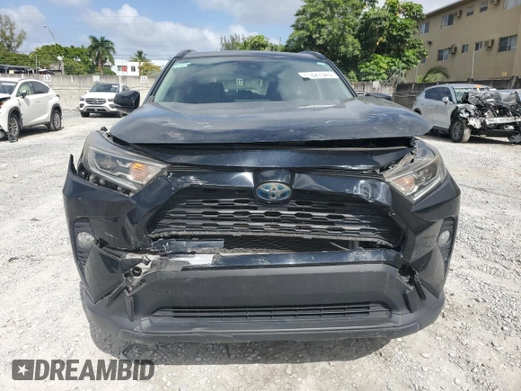 2019 Toyota RAV4 Hybrid XLE with VIN JTMRWRFV3KD020929, listed as a Copart auction lot 51827345 with 79,991 mi miles and Non Repairable. Bid and sale history available at carsss.com. Image 5.