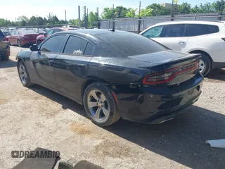 2015 Dodge Charger SXT with VIN 2C3CDXHG5FH928553, listed as a IAAI auction lot 42279342 with 129,402 mi miles and . Bid and sale history available at DreamBid. Image 3.