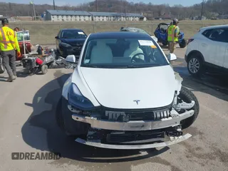 2021 Tesla Model 3 Long Range z VIN 5YJ3E1EB0MF860289, wystawiony jako IAAI lot #41771854 z przebiegiem 190 892 mil mil oraz . Historia ofert i sprzedaży dostępna na DreamBid. Obrazek 13.