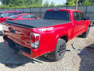 2022 Toyota Tacoma SR5 with VIN 3TMDZ5BN6NM139342, listed as a IAAI auction lot 42711808 with 46,826 mi miles and . Bid and sale history available at DreamBid. Image 4.
