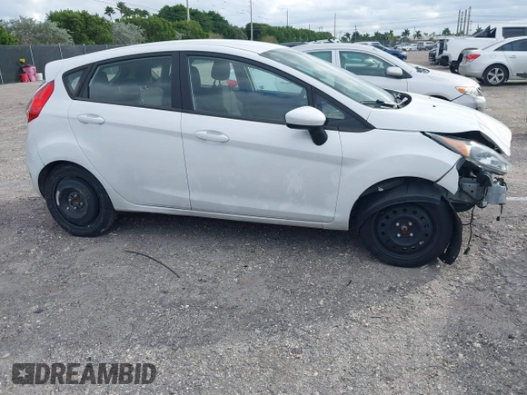 2019 Ford Fiesta SE z VIN 3FADP4EJ5KM132862, wystawiony jako IAAI lot #40893430 z przebiegiem 91 011 mil mil oraz . Historia ofert i sprzedaży dostępna na DreamBid. Obrazek 1.