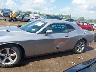 2013 Dodge Challenger SXT с VIN 2C3CDYAG7DH675121, выставлен на аукционе IAAI как лот 42623166 с пробегом 189 604 миль миль и . История ставок и продаж доступна на DreamBid. Изображение 15.