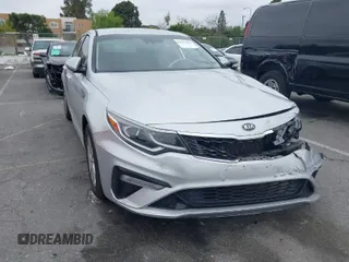 2019 Kia Optima LX with VIN 5XXGT4L3XKG285486, listed as a IAAI auction lot 41872981 with 101,981 mi miles. Bid and sale history available at carsss.com. Image 1.