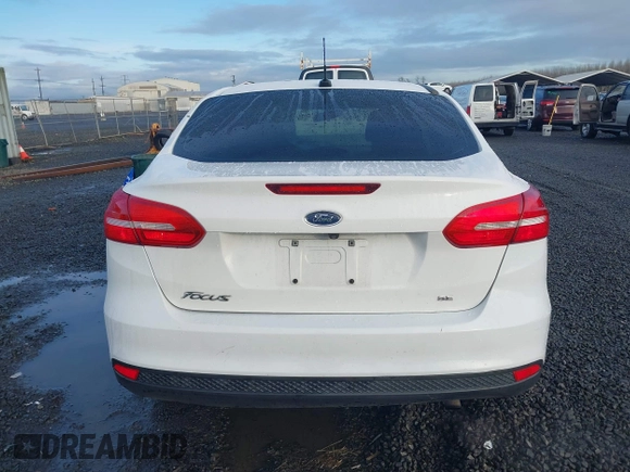 2018 Ford Focus SE with VIN 1FADP3F23JL242066, listed as a IAAI auction lot 41804512 with 99,662 mi miles. Bid and sale history available at carsss.com. Image 16.
