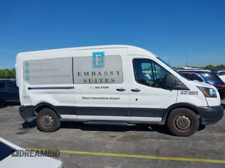 2016 Ford Transit Passenger XL z VIN 1FBZX2CM2GKB51339, wystawiony jako IAAI lot #41429005 z przebiegiem 215 896 mil mil oraz . Historia ofert i sprzedaży dostępna na DreamBid. Obrazek 13.