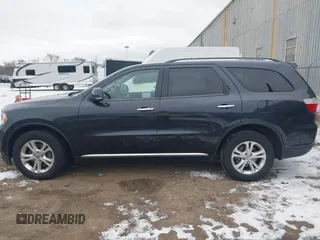 2013 Dodge Durango Crew z VIN 1C4SDJDT7DC684766, wystawiony jako IAAI lot #41277670 z przebiegiem 115 555 mil mil oraz . Historia ofert i sprzedaży dostępna na DreamBid. Obrazek 14.
