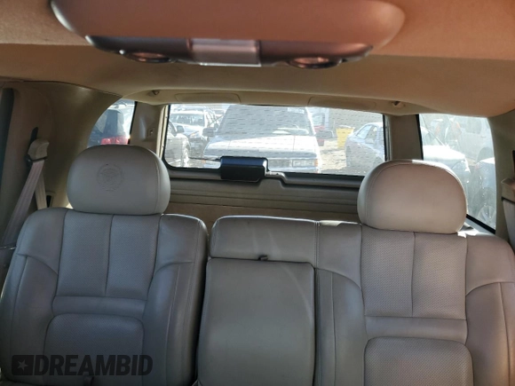 2000 Cadillac Escalade z VIN 1GYEK63R3YR218500, wystawiony jako Copart lot #77676354 z przebiegiem 164 602 mil mil oraz Czysty tytuł • Clean title. Historia ofert i sprzedaży dostępna na DreamBid. Obrazek 10.