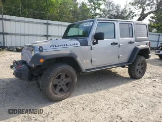 2013 Jeep Wrangler Unlimited Rubicon with VIN 1C4BJWFG7DL689486, listed as a Copart auction lot 54491205 with 113,664 mi miles and Salvage title. Bid and sale history available at DreamBid. Image 1.