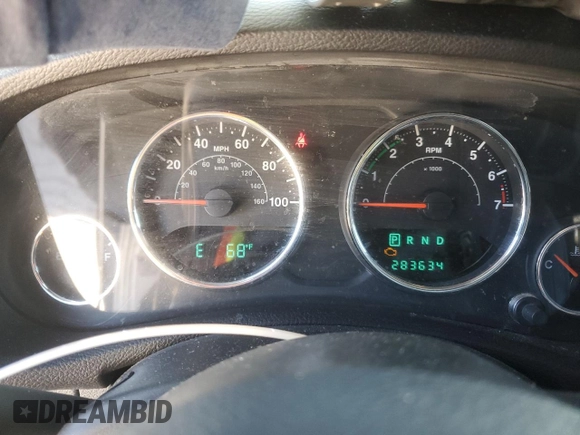 2014 Jeep Wrangler Sahara with VIN 1C4AJWBGXEL214269, listed as a Copart auction lot 47678045 with 283,634 mi miles and Clean Title. Bid and sale history available at DreamBid. Image 9.