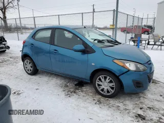 2012 Mazda 2 Sport with VIN JM1DE1KZ1C0151843, listed as a Copart auction lot 88695585 with 121,510 mi miles and Non Repairable. Bid and sale history available at DreamBid. Image 4.