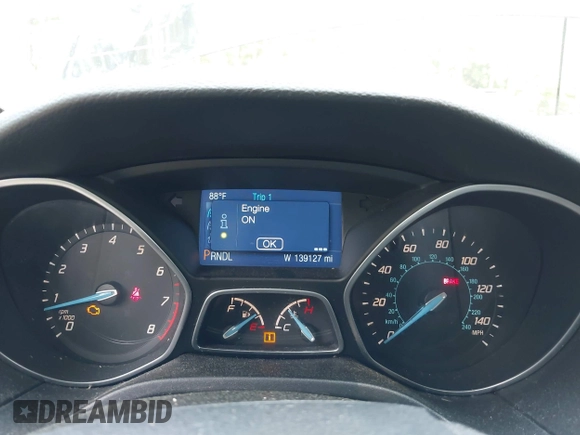 2014 Ford Focus SE z VIN 1FADP3K23EL284216, wystawiony jako IAAI lot #42489699 z przebiegiem 139 127 mil mil oraz . Historia ofert i sprzedaży dostępna na DreamBid. Obrazek 7.