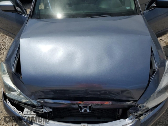 2007 Honda Accord LX z VIN 1HGCM564X7A085959, wystawiony jako Copart lot #57999935 z przebiegiem 177 132 mil mil oraz Szkoda całkowita • Salvage title. Historia ofert i sprzedaży dostępna na DreamBid. Obrazek 11.