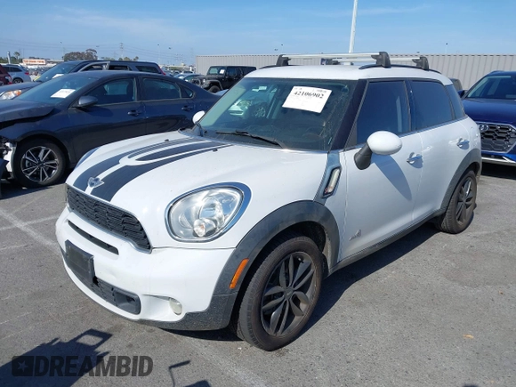 2014 MINI Countryman S с VIN WMWZC5C5XEWM18313, выставлен на аукционе IAAI как лот 42106902 с пробегом 91 662 миль миль и . История ставок и продаж доступна на DreamBid. Изображение 2.