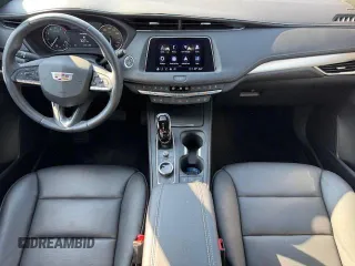 2023 Cadillac XT4 AWD Premium Luxury with VIN 1GYFZDR40PF108407, listed as a Copart auction lot 54799365 with 8,724 mi miles and Non Repairable. Bid and sale history available at carsss.com. Image 8.