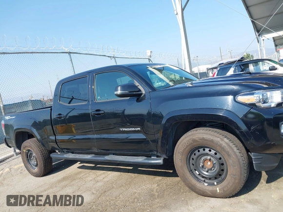 2022 Toyota Tacoma SR5 with VIN 3TMBZ5DN6NM034630, listed as a IAAI auction lot 42733932 with 43,309 mi miles and . Bid and sale history available at DreamBid. Image 13.